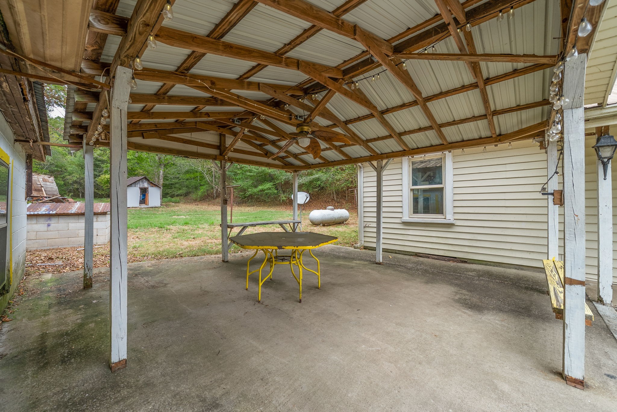 234 Lower Standing Rock Road Dover, TN 37058 - Photo 28 of 41 a view of a porch with furniture and a yard