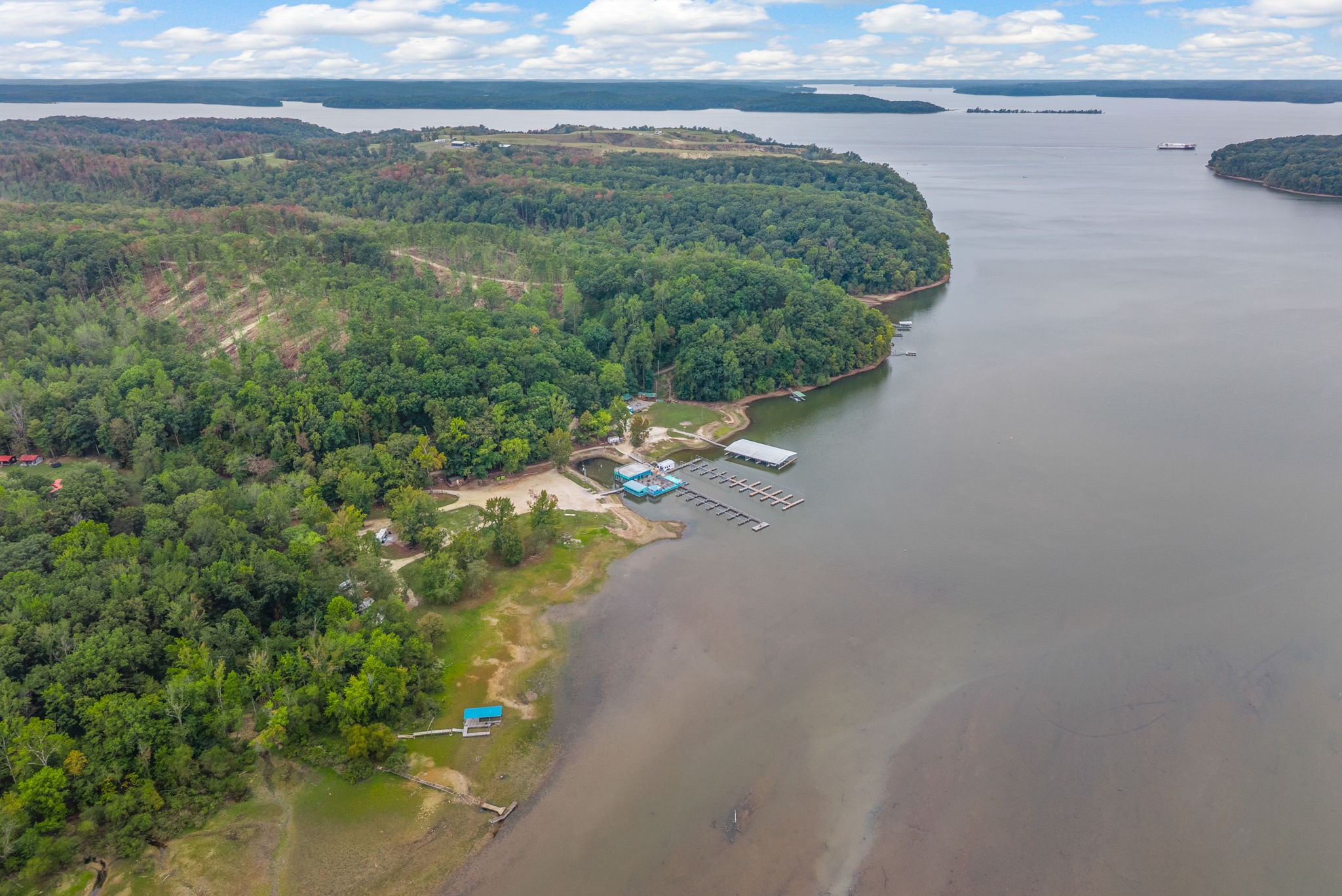 234 Lower Standing Rock Road Dover, TN 37058 - Photo 39 of 41 a view of a lake with a yard