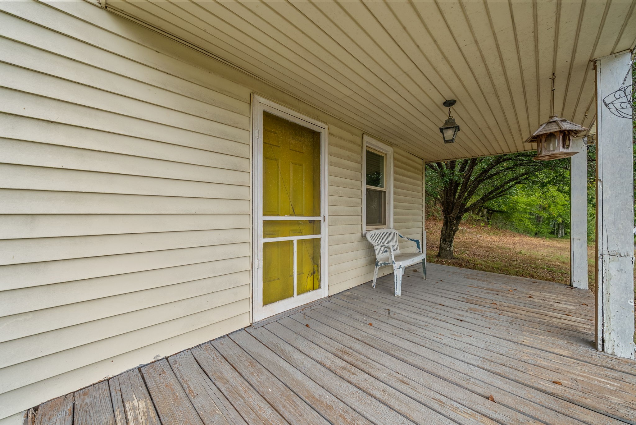 234 Lower Standing Rock Road Dover, TN 37058 - Photo 6 of 41 a porch with seating space