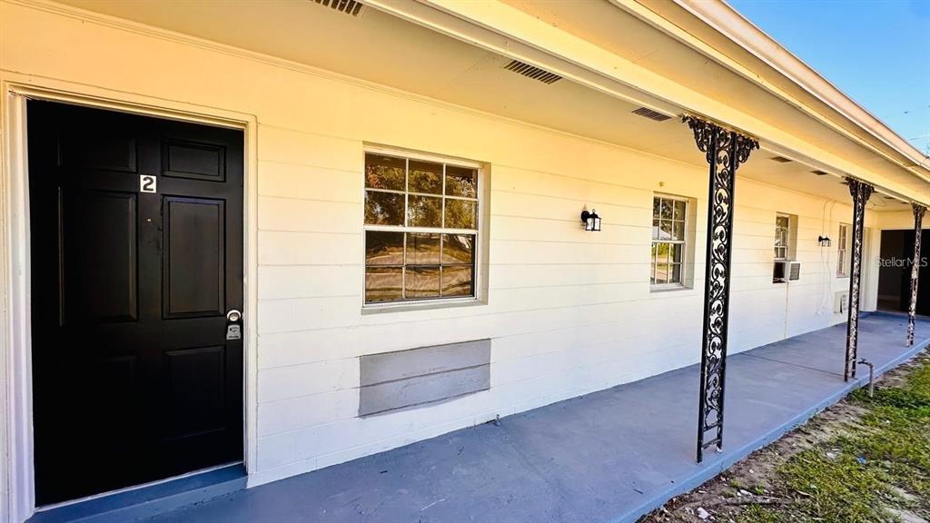 390 West Haines Boulevard, Unit 2 Lake Alfred, FL 33850 - Photo 2 of 7 a view of front door