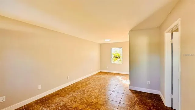 an empty room with a window