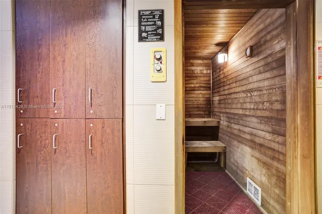 a room with pool table and a wall painting