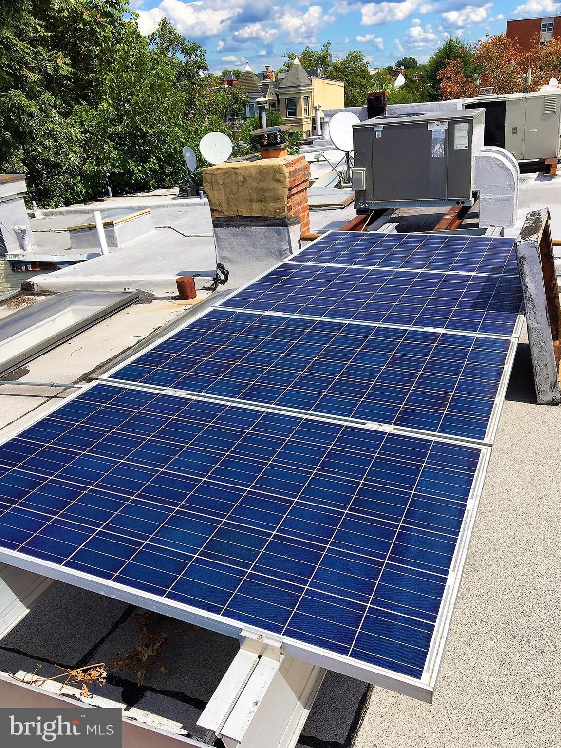 718 F Street Northeast Washington, DC 20002 - Photo 34 of 41 Solar Panels on Roof cost-saving on bills.