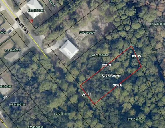 an aerial view of house with yard