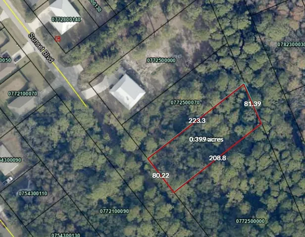 an aerial view of house with yard