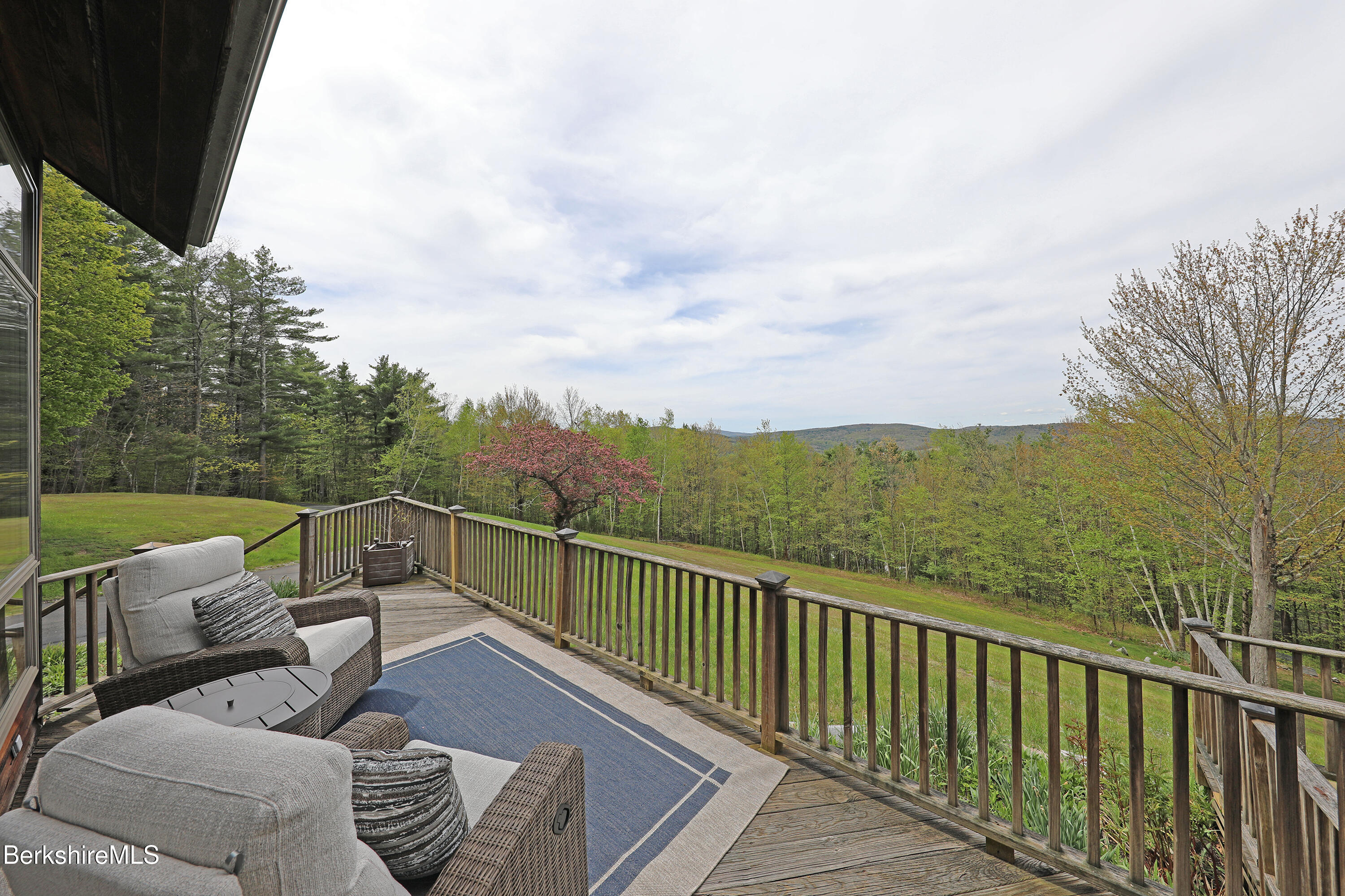 126 Temple Road New Lebanon, NY 12125 - Photo 22 of 37 a view of a balcony with couches and sky view