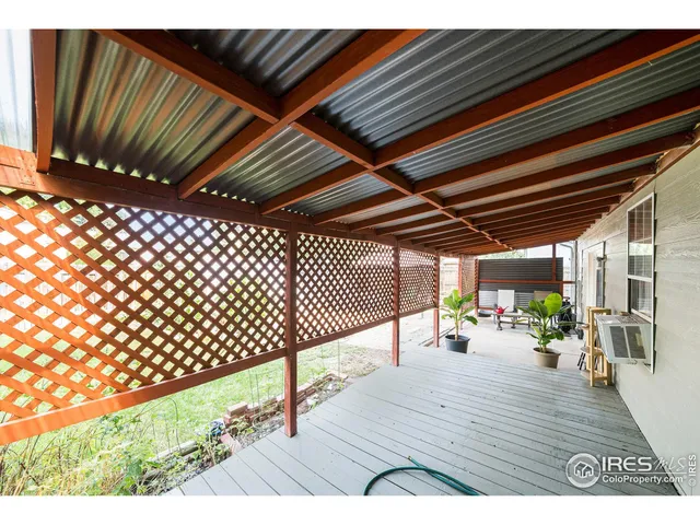 a view of a backyard of the house