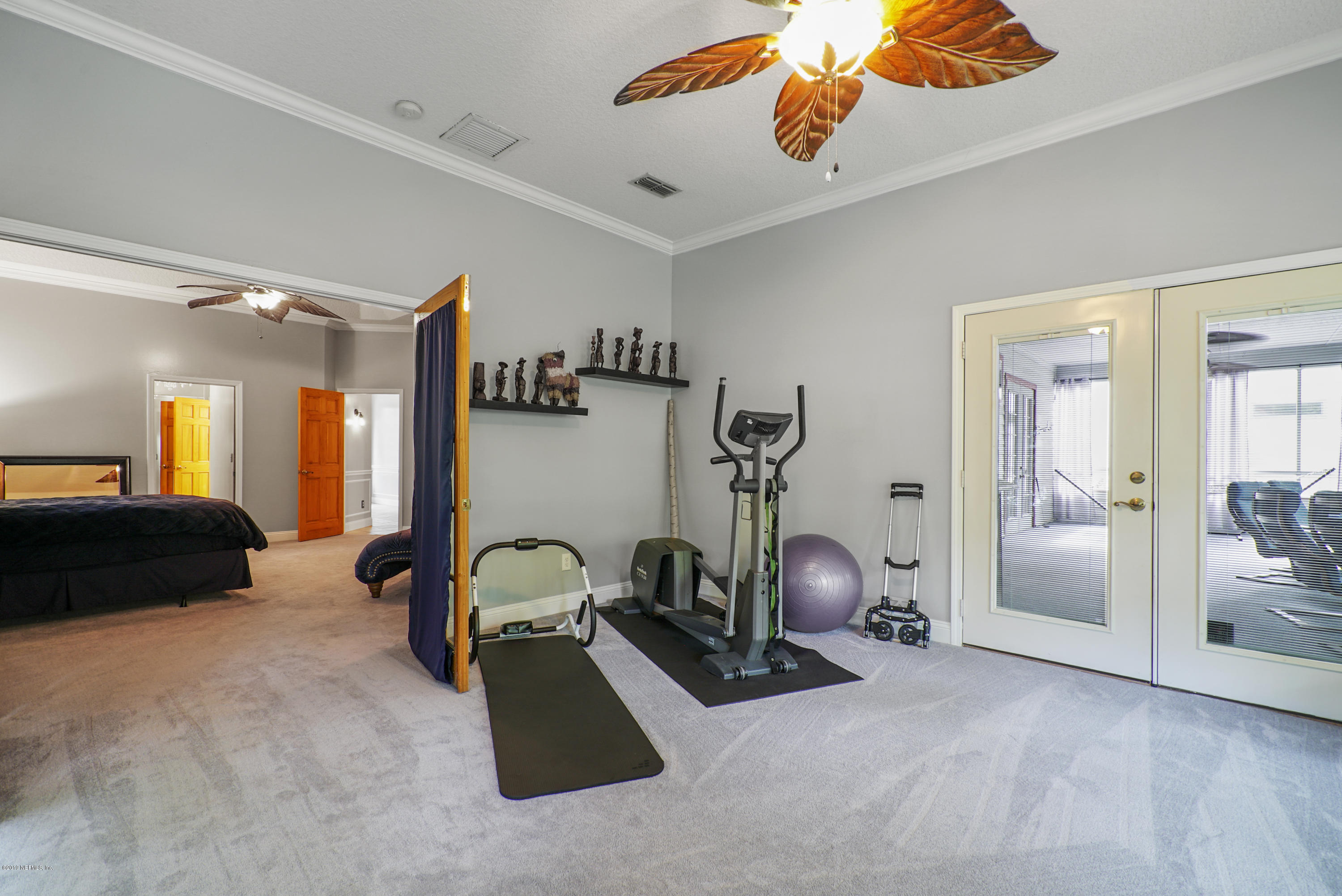 2066 Cornell Road Middleburg, FL 32068 - Photo 26 of 43 a bedroom with furniture and a window