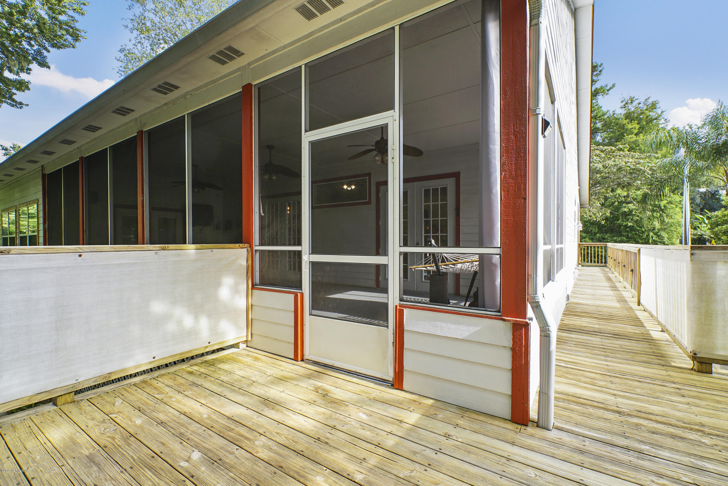2066 Cornell Road Middleburg, FL 32068 - Photo 33 of 43 a view of a balcony with wooden floor and fence
