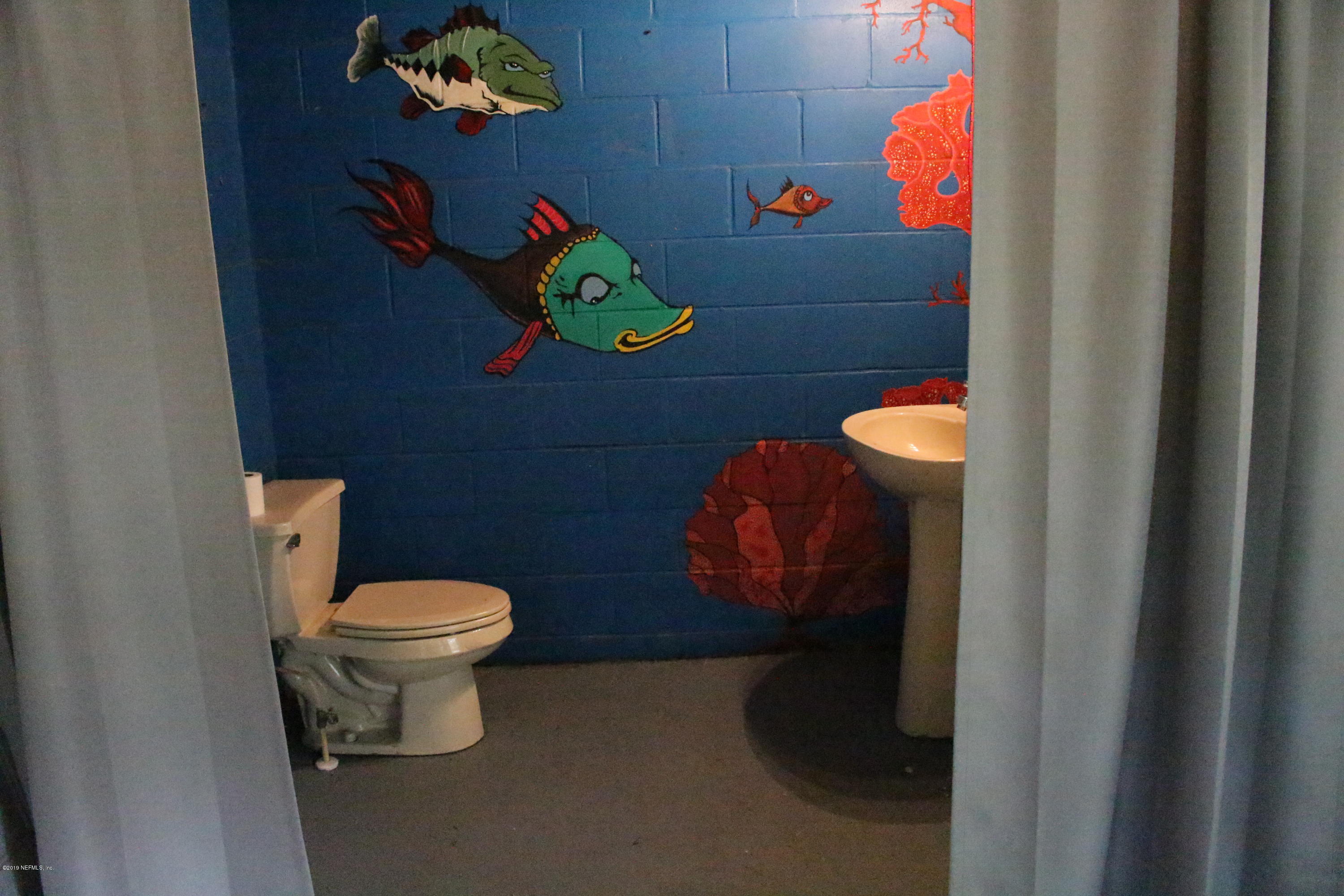 2066 Cornell Road Middleburg, FL 32068 - Photo 40 of 43 a bathroom with a toilet and a sink