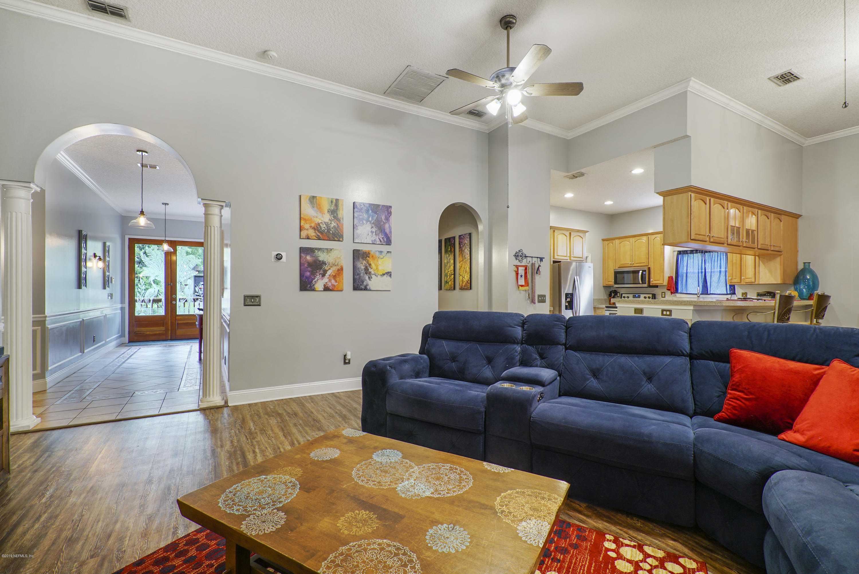 2066 Cornell Road Middleburg, FL 32068 - Photo 8 of 43 a living room with furniture and a view of kitchen