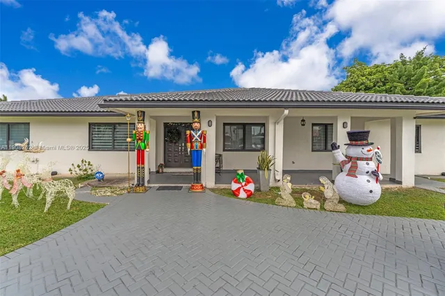 a front view of a house with patio