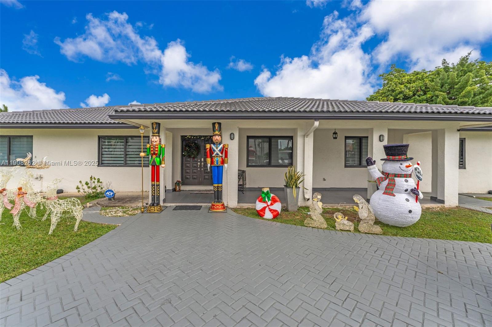a front view of a house with patio