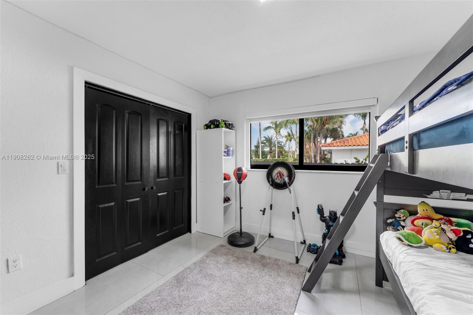 551 Southwest 127th Avenue Miami, FL 33184 - Photo 19 of 47 a view of a room with gym equipment