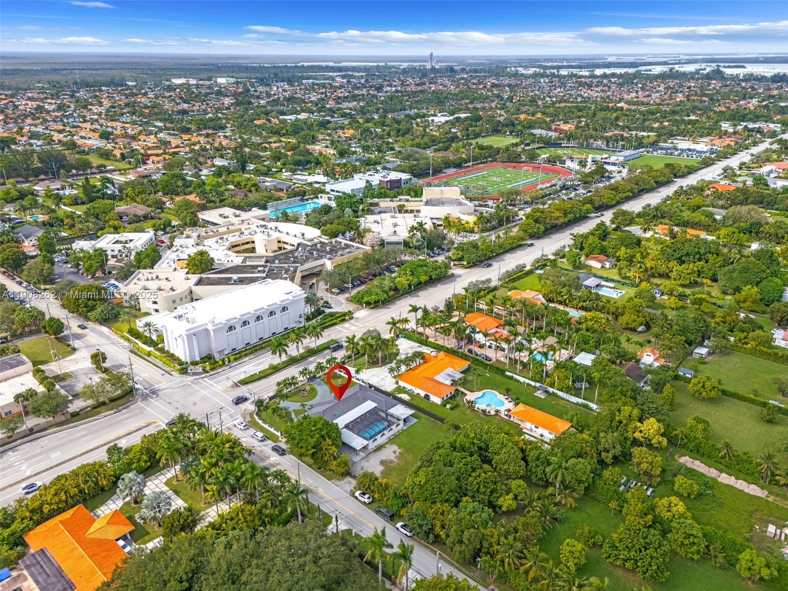 551 Southwest 127th Avenue Miami, FL 33184 - Photo 43 of 47 an aerial view of residential houses with outdoor space and trees