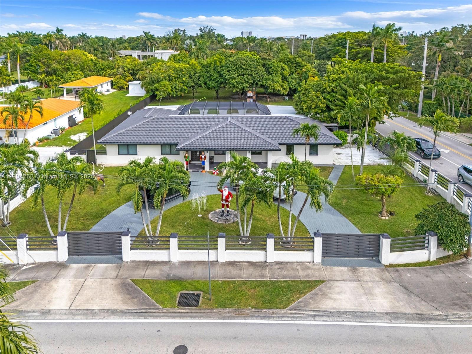 551 Southwest 127th Avenue Miami, FL 33184 - Photo 47 of 47 an aerial view of residential houses and car parked