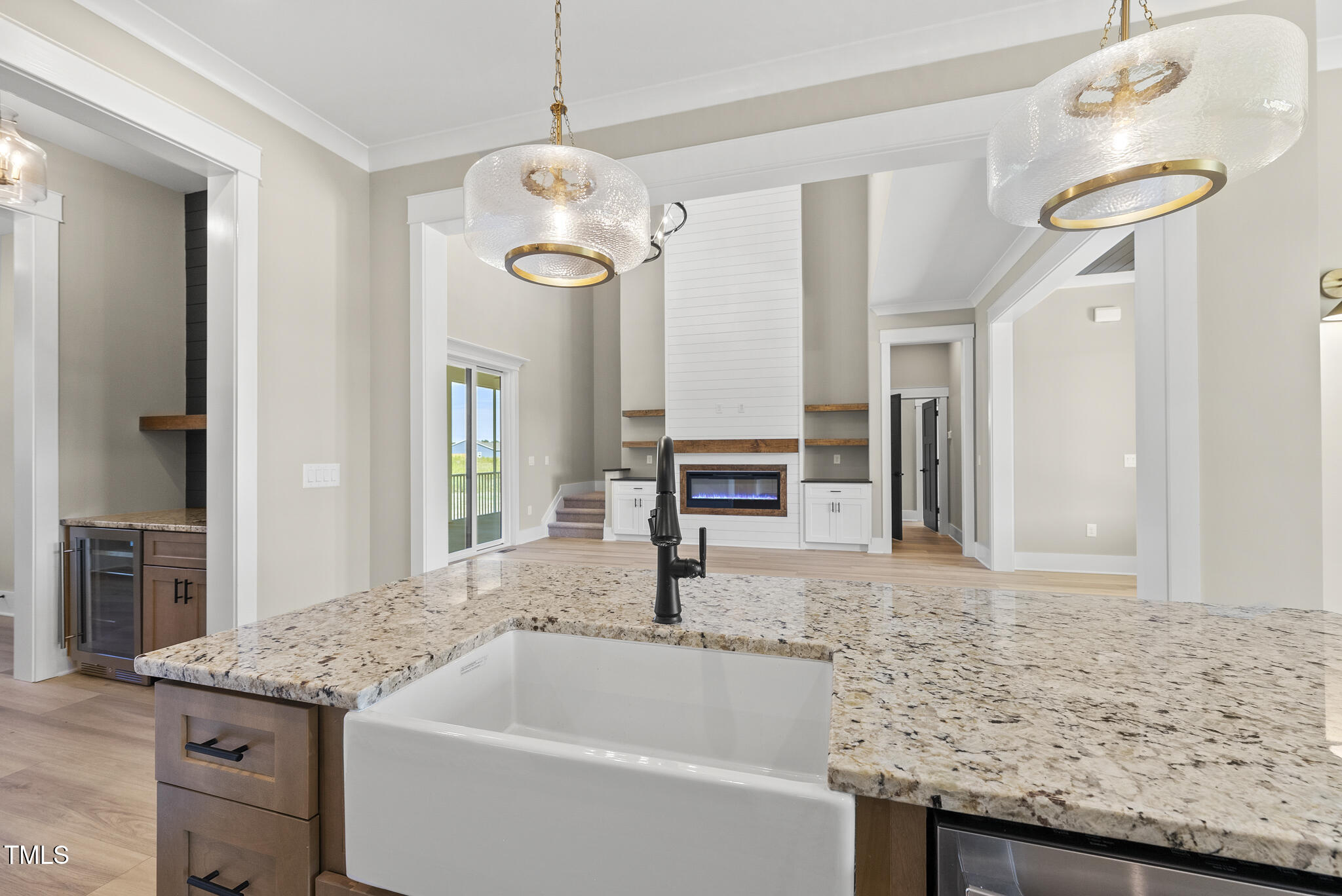 2560 Lassiter Road Four Oaks, NC 27524 - Photo 17 of 66 a bathroom with a granite countertop sink a mirror and shower