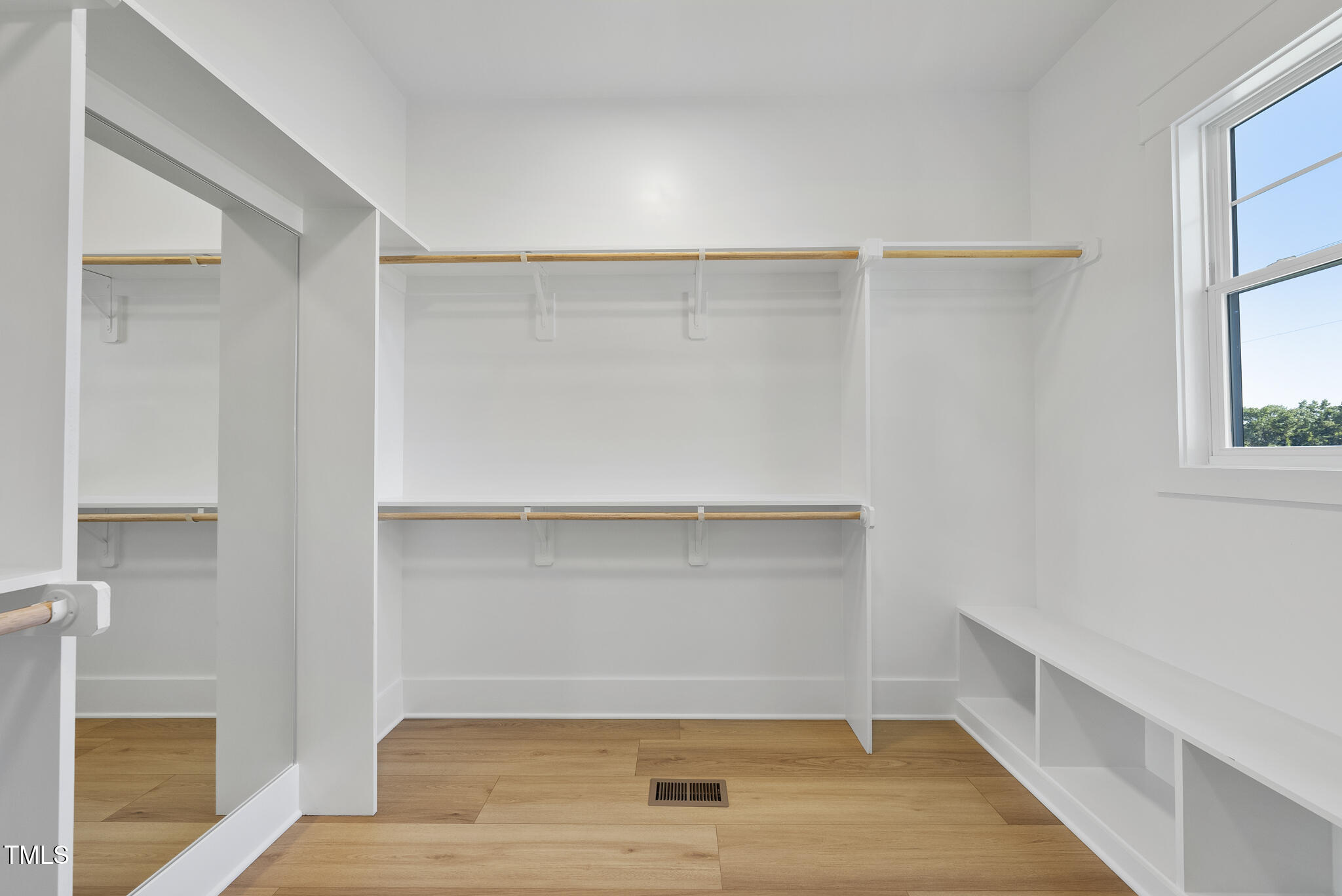 2560 Lassiter Road Four Oaks, NC 27524 - Photo 40 of 66 a view of an empty walk in closet