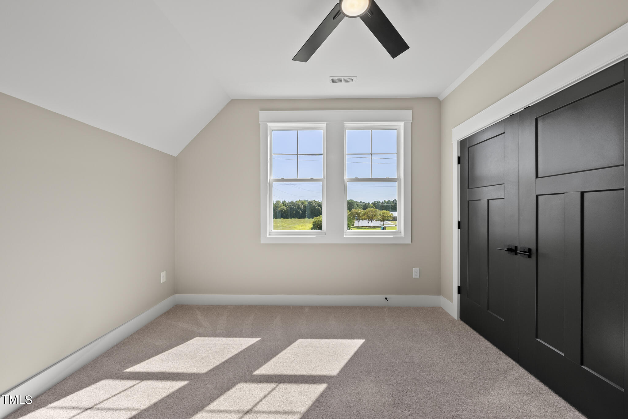 2560 Lassiter Road Four Oaks, NC 27524 - Photo 43 of 66 an empty room with windows