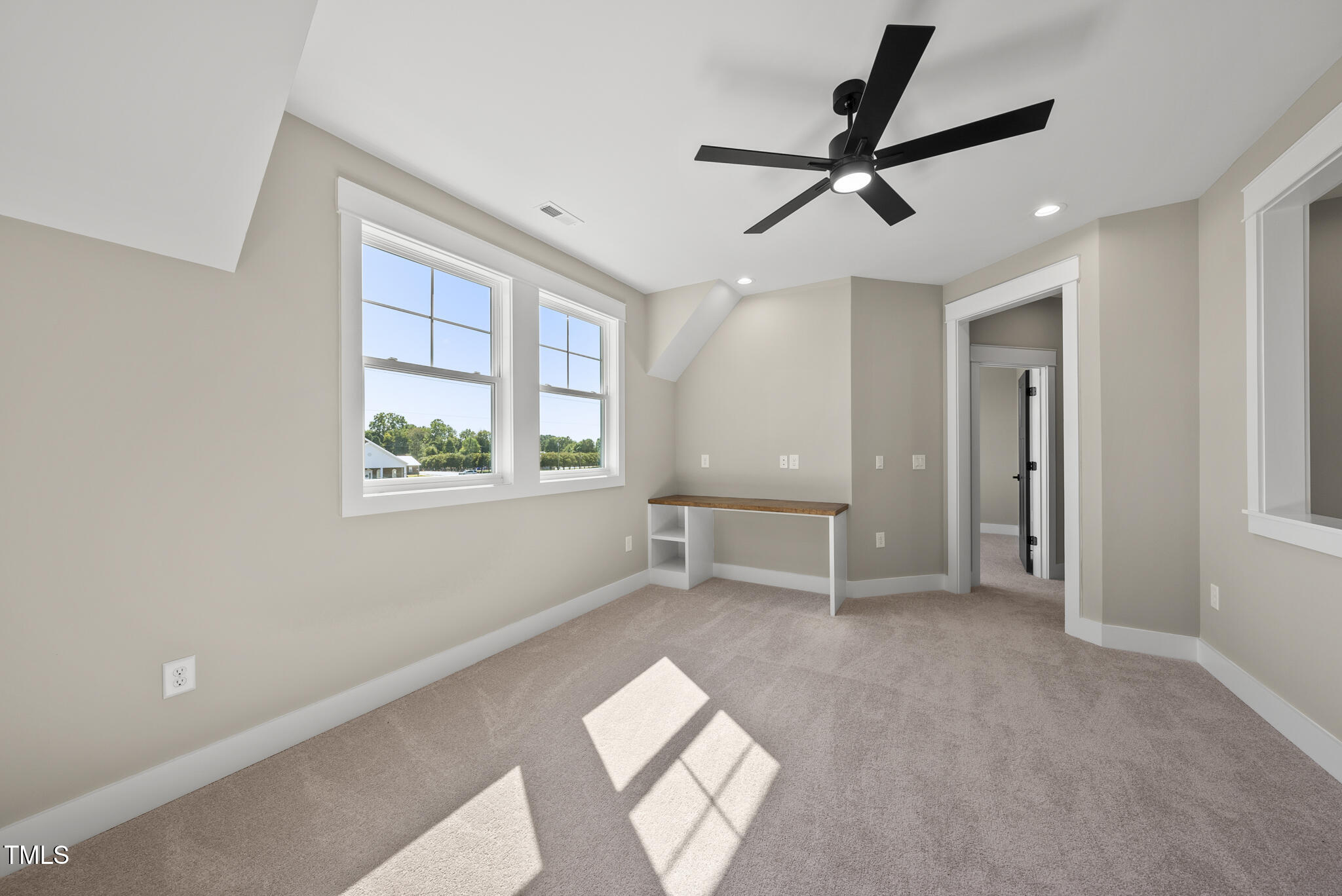 2560 Lassiter Road Four Oaks, NC 27524 - Photo 50 of 66 a view of workspace with window and ceiling fan