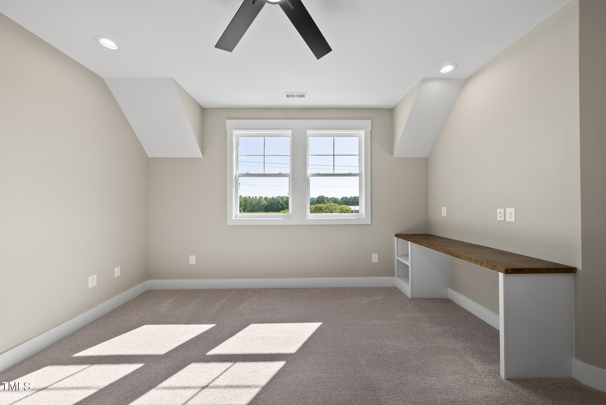 2560 Lassiter Road Four Oaks, NC 27524 - Photo 51 of 66 a view of an empty room with a window