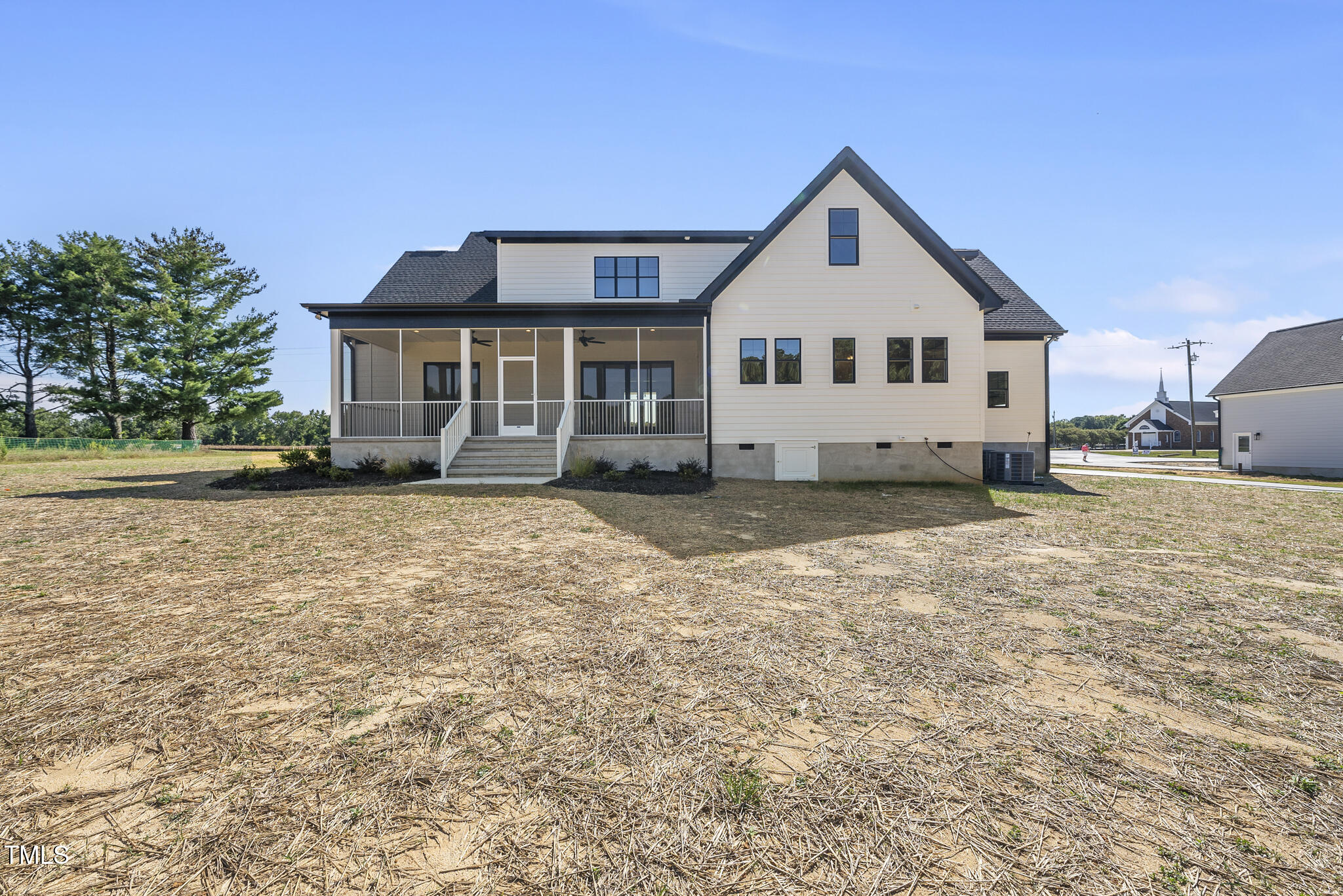 2560 Lassiter Road Four Oaks, NC 27524 - Photo 6 of 66 a front view of a house with a yard