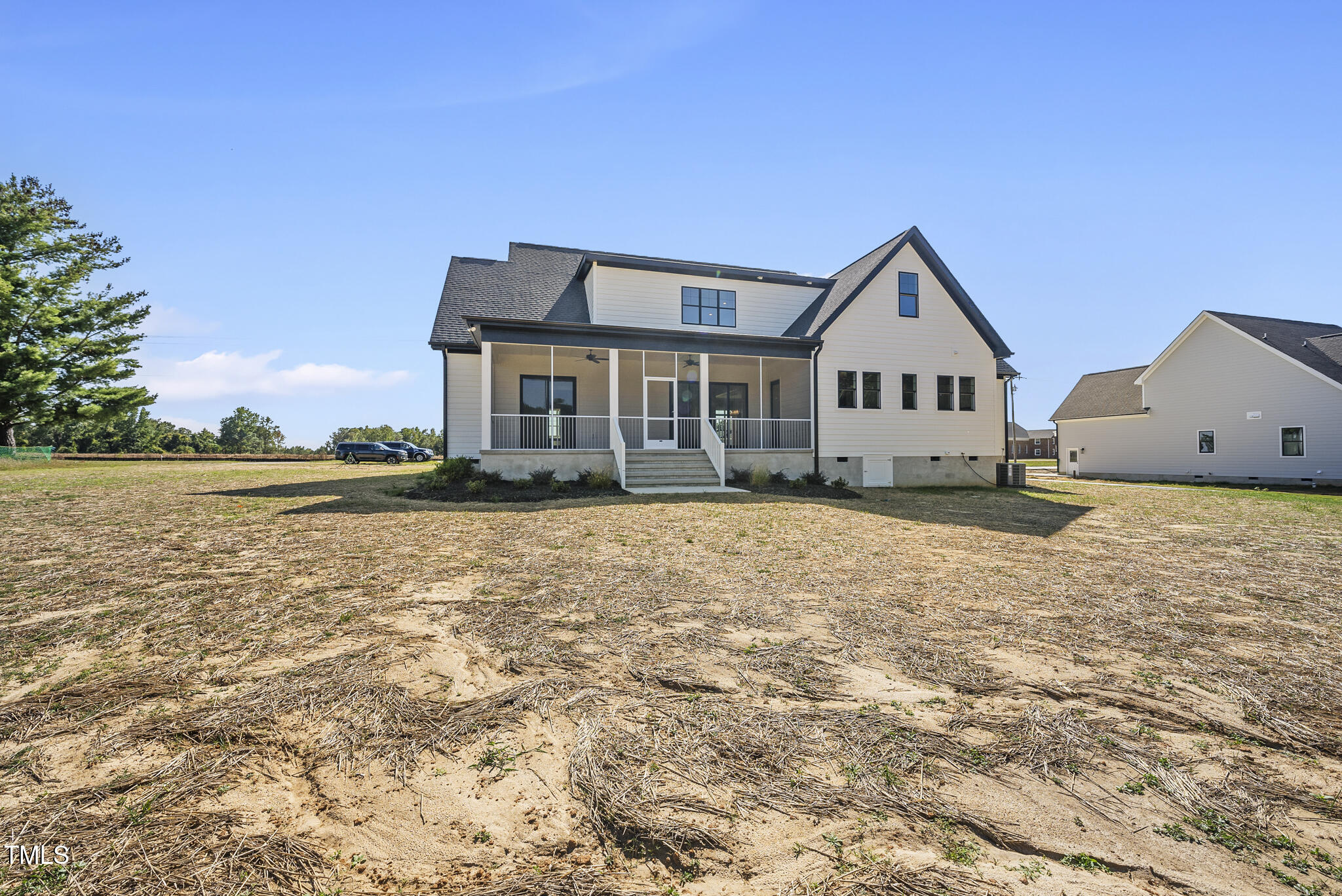2560 Lassiter Road Four Oaks, NC 27524 - Photo 7 of 66 a front view of a house with a yard