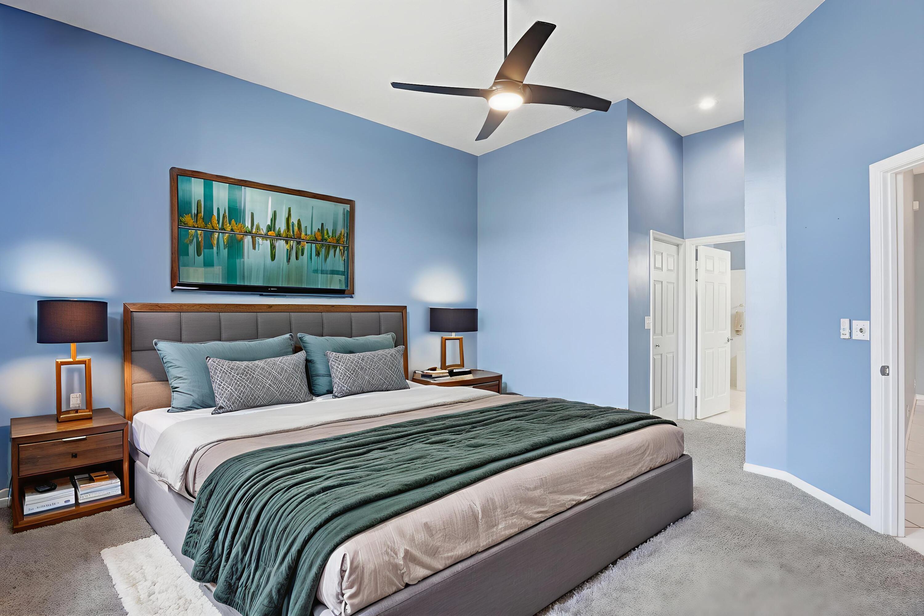 5405 Monterey Circle, Unit G Delray Beach, FL 33484 - Photo 34 of 72 a bedroom with a bed and a painting on the wall