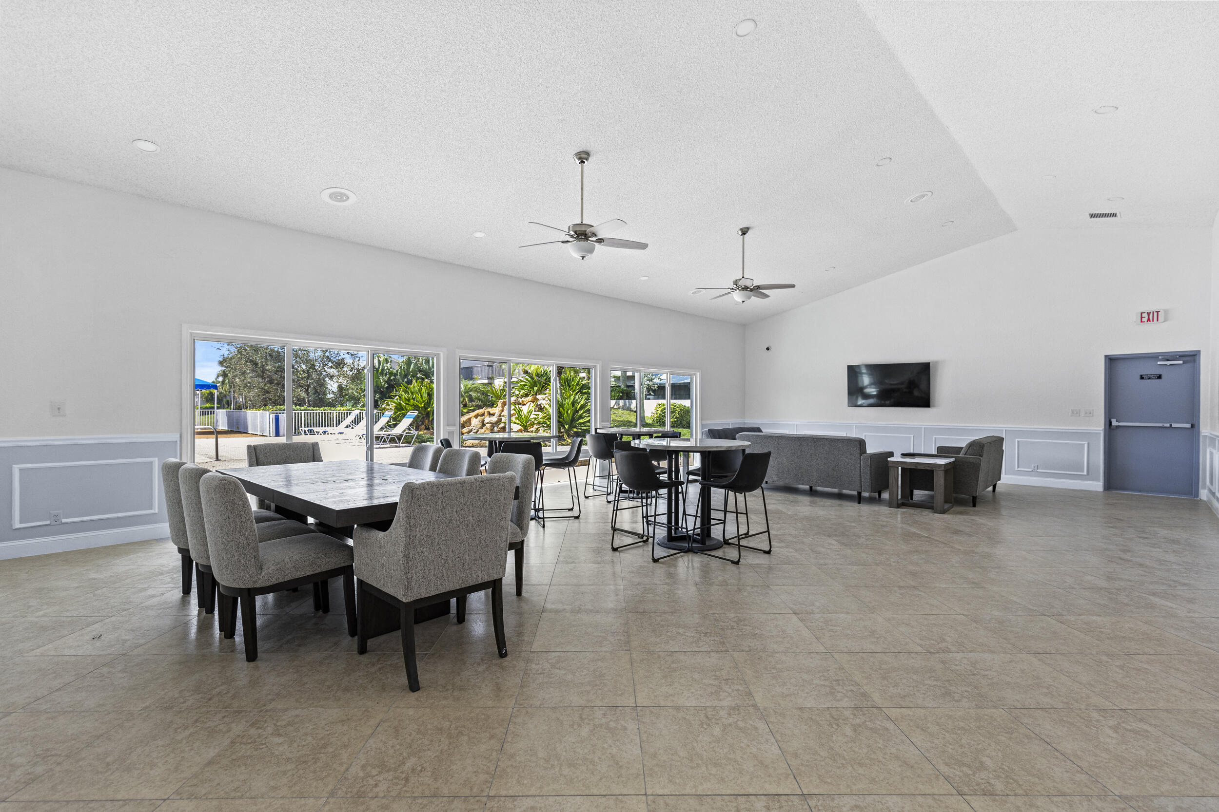 5405 Monterey Circle, Unit G Delray Beach, FL 33484 - Photo 67 of 72 a view of a dining room with furniture window and outside view
