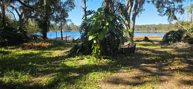 a view of a lake with outdoor space