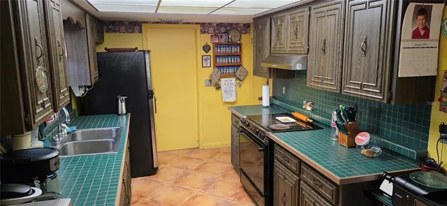 a bathroom with a sink and mirror