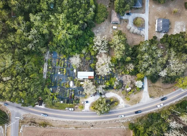 a view of a lake view with houses in back