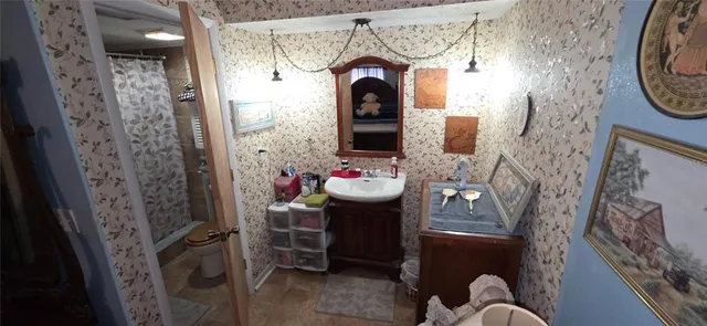 a view of a yard with a tree