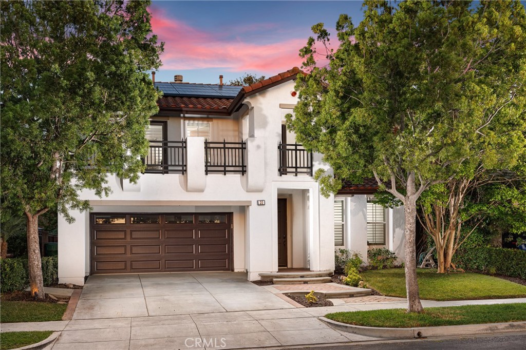20 St Just Avenue Ladera Ranch, CA 92694 - Photo 1 of 1 a front view of a house with a garden