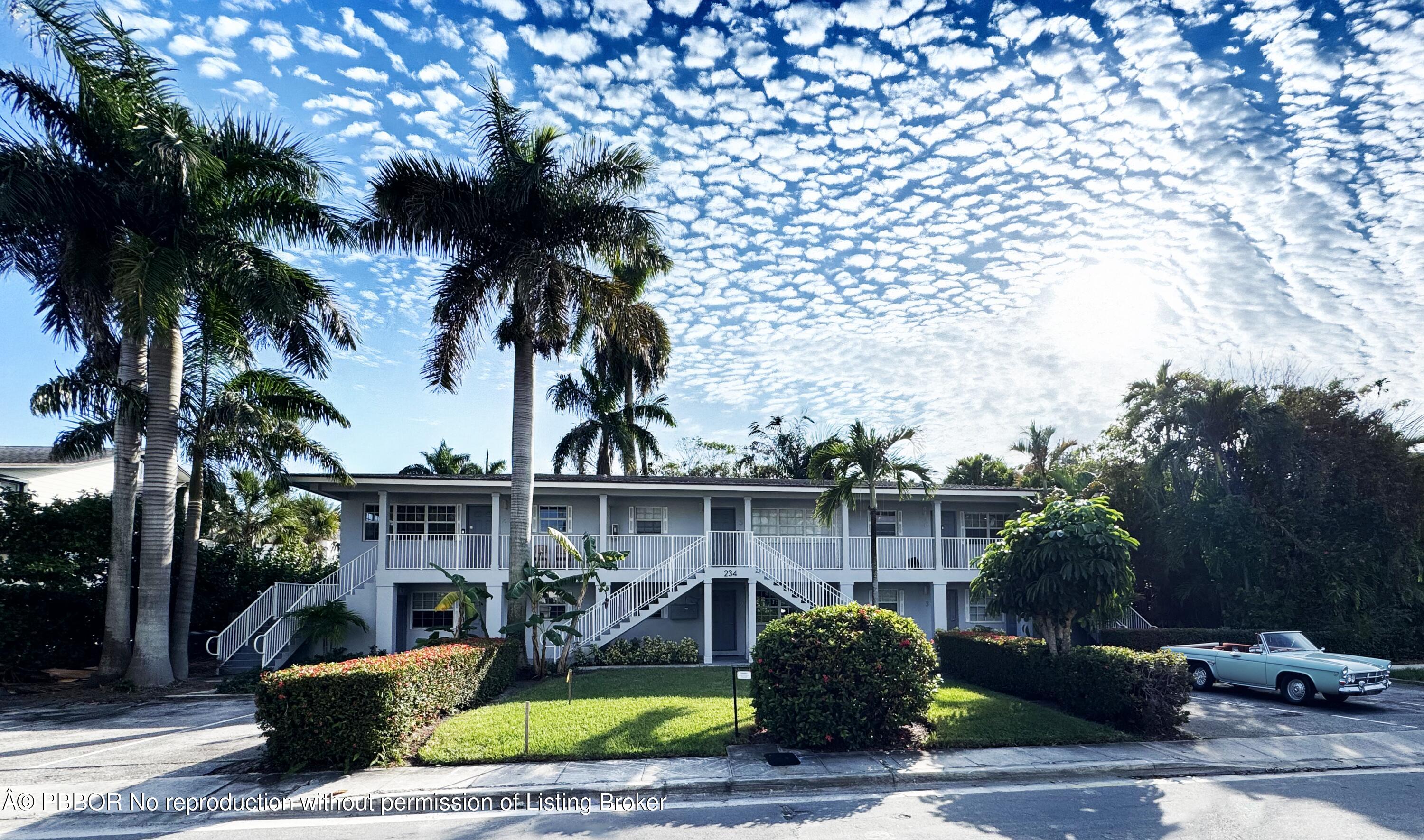 234 Oleander Avenue, Unit 2 Palm Beach, FL 33480 - Photo 7 of 18 a view of a swimming pool with a patio and a garden