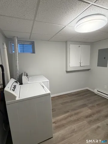 a utility room with dryer and washer