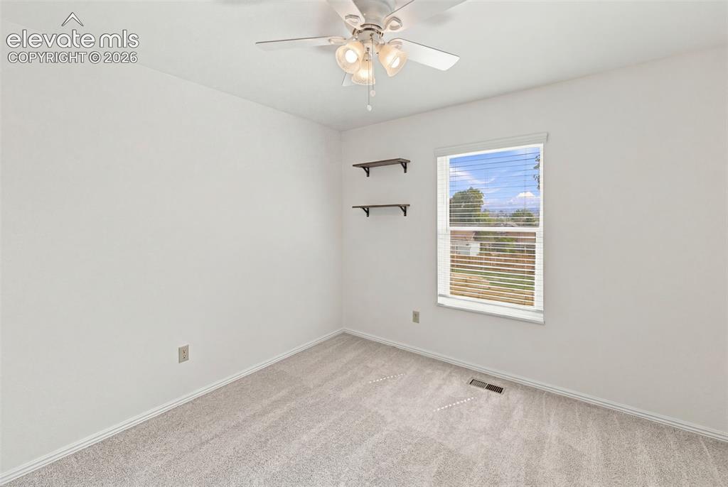 1239 Suncrest Way Colorado Springs, CO 80906 - Photo 35 of 46 Bedroom 3 - main level