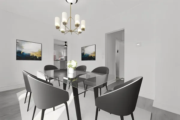 a dining room with furniture and chandelier