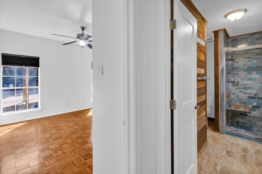 14277 Preston Road, Unit C315 Dallas, TX 75254 - Photo 11 of 26 View of primary bedroom and bathroom