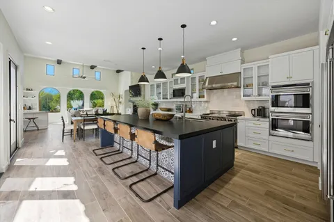 a kitchen with counter space and center island