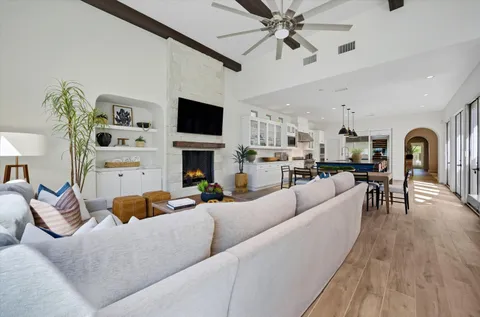 a bathroom with a sink mirror vanity and toilet