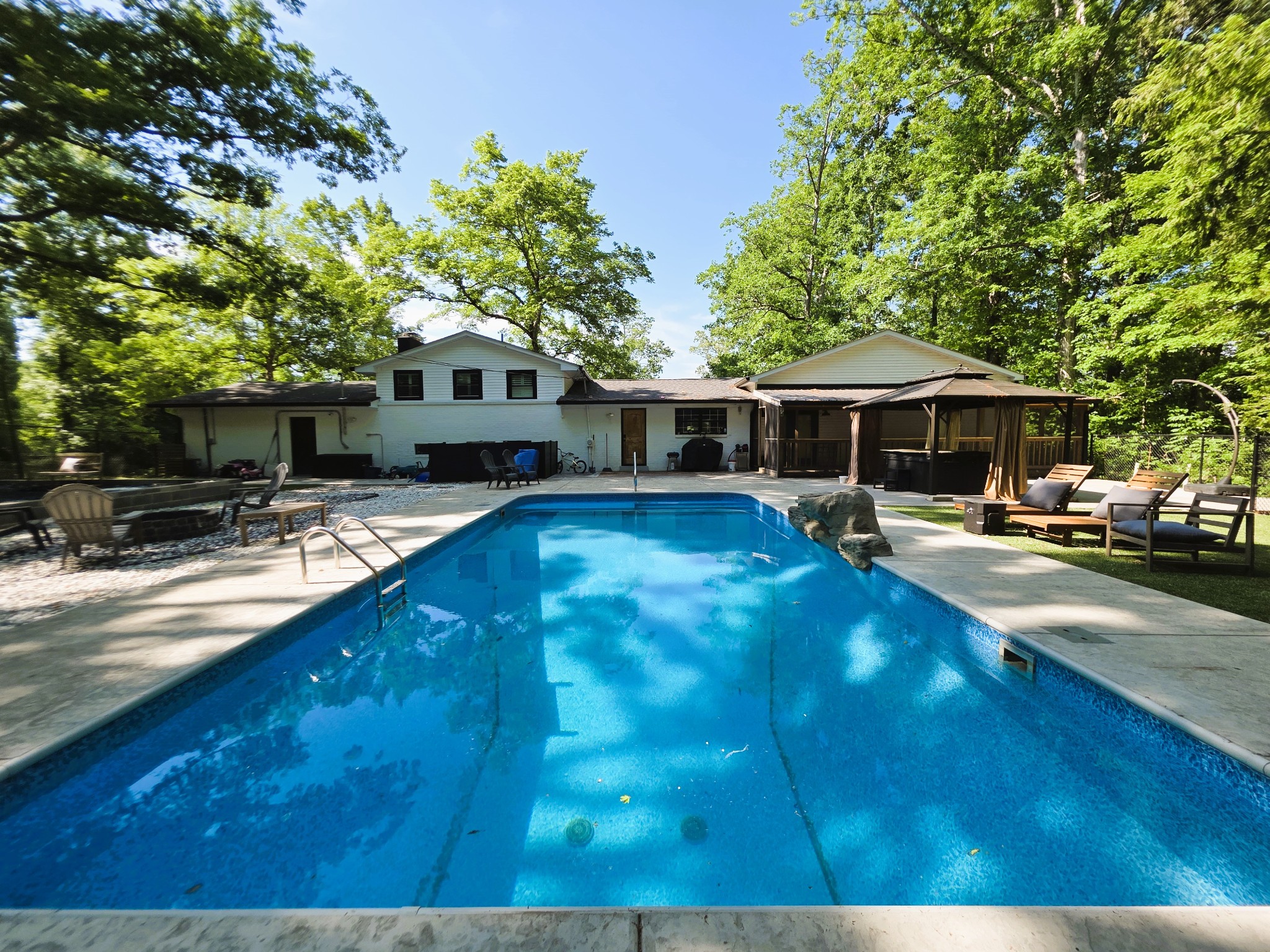 1975 Kelly Road Holladay, TN 38341 - Photo 16 of 95 a view of a house with pool and chairs