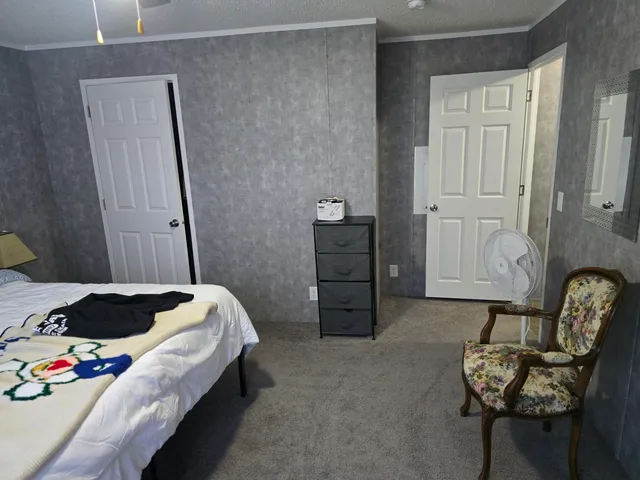 a kitchen with stainless steel appliances granite countertop a sink dishwasher stove and cabinets