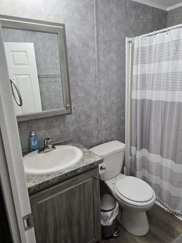 a view of a lake with a big yard