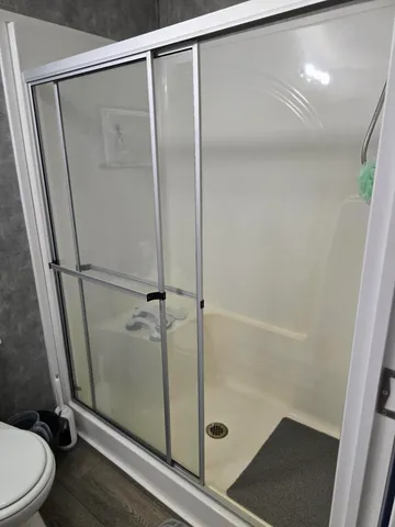 a view of gym equipment with outdoor seating