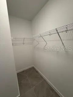 a view of a room with racks on the wall