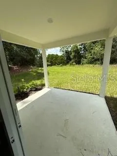 a view of swimming pool from a balcony