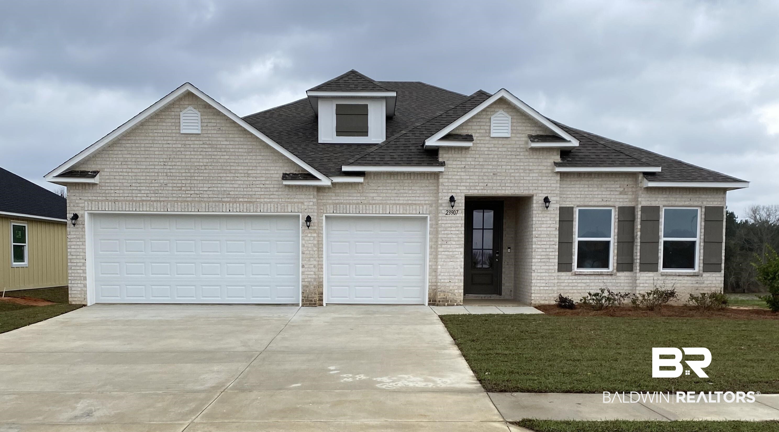 23907 Shadowridge Drive Daphne, AL 36526 - Photo 1 of 1 View of front of home featuring a front lawn