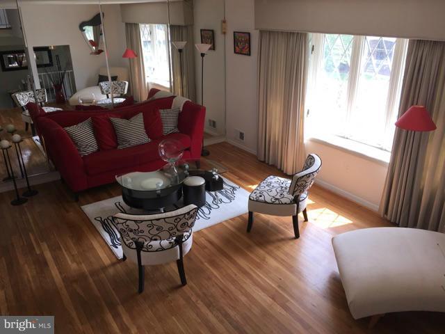 4404 Kinmount Road Lanham, MD 20706 - Photo 4 of 17 a living room with furniture and wooden floor