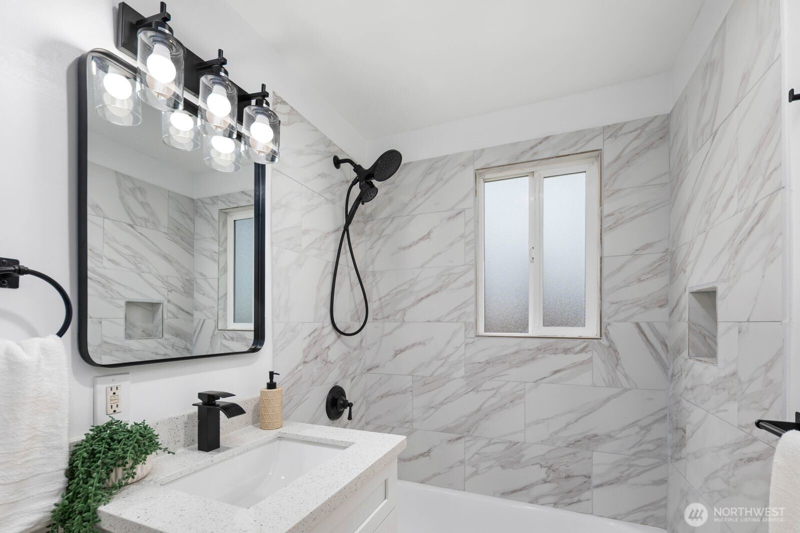 505 Southwest 305th Street Federal Way, WA 98023 - Photo 21 of 38 a bathroom with a sink and mirror